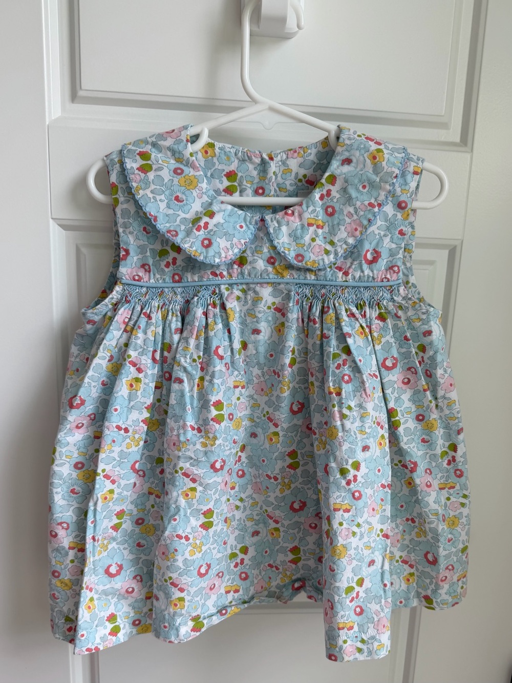 Delaney Sleeveless 100% Cotton Floral Smocked Peter Pan Collar Shirt